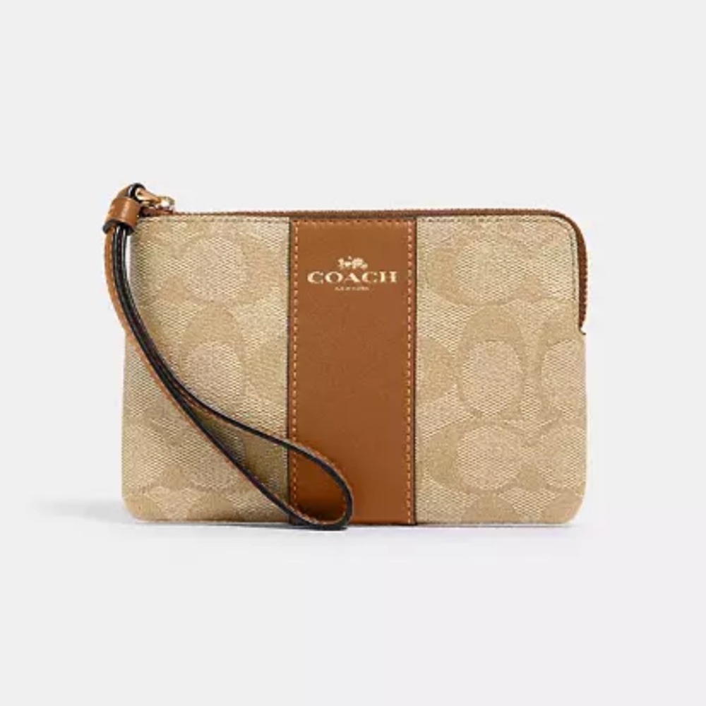 Coach CORNER ZIP WRISTLET IN SIGNATURE CANVAS new in packaging